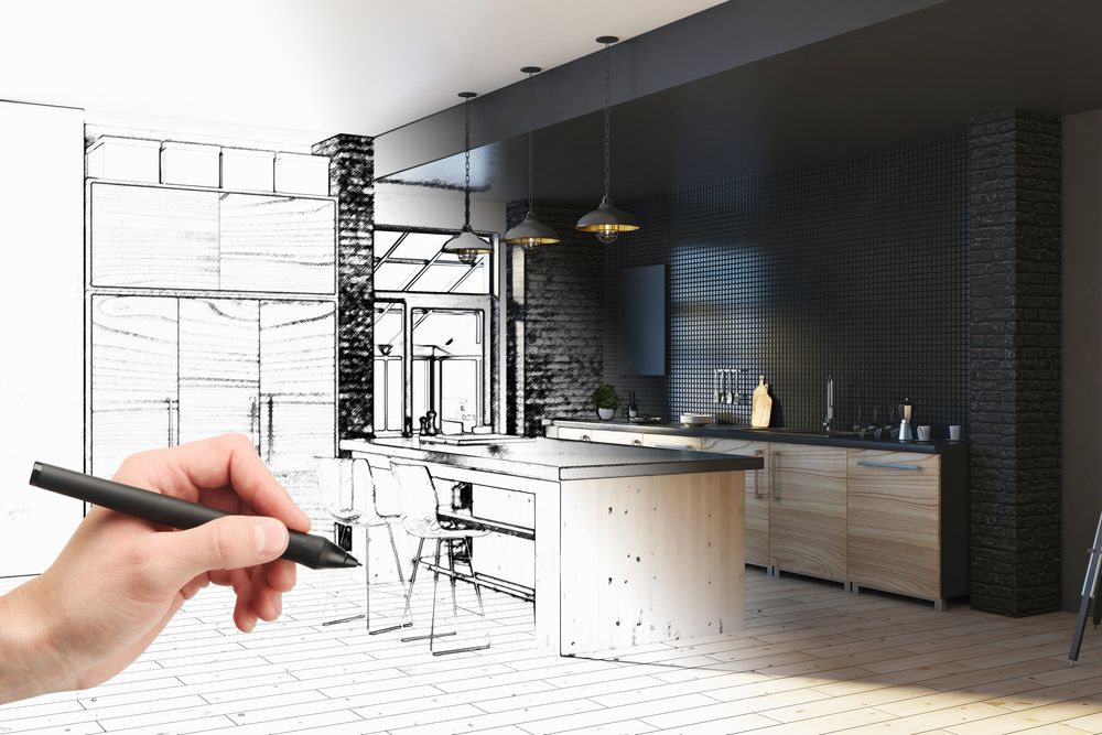 A person is drawing a kitchen with a pen.