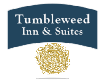 A blue sign that says tumbleweed inn & suites