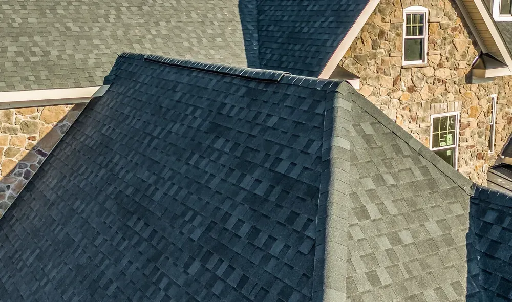 Aerial close-up view of a modern asphalt shingle roof