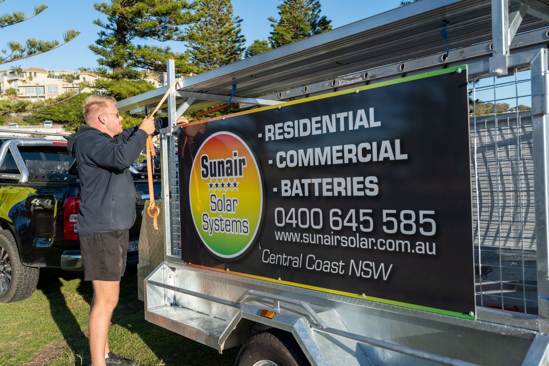 Sunair Solar Member holding the rope — Solar Systems in West Gosford, NSW