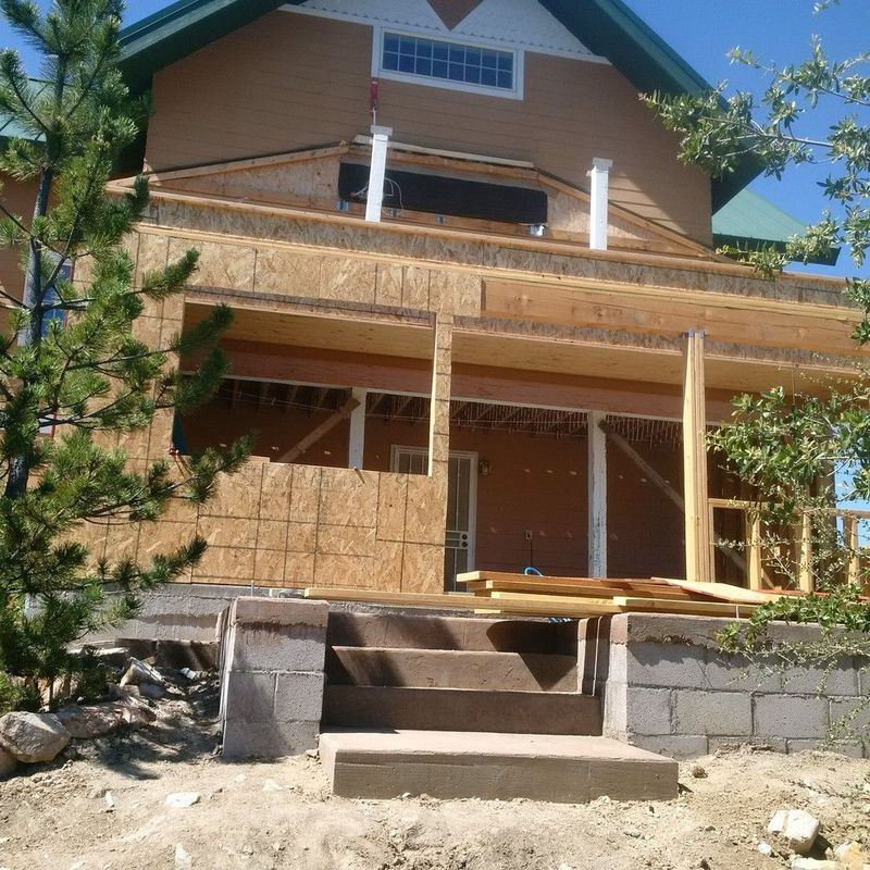A house that is being built with the word club on it