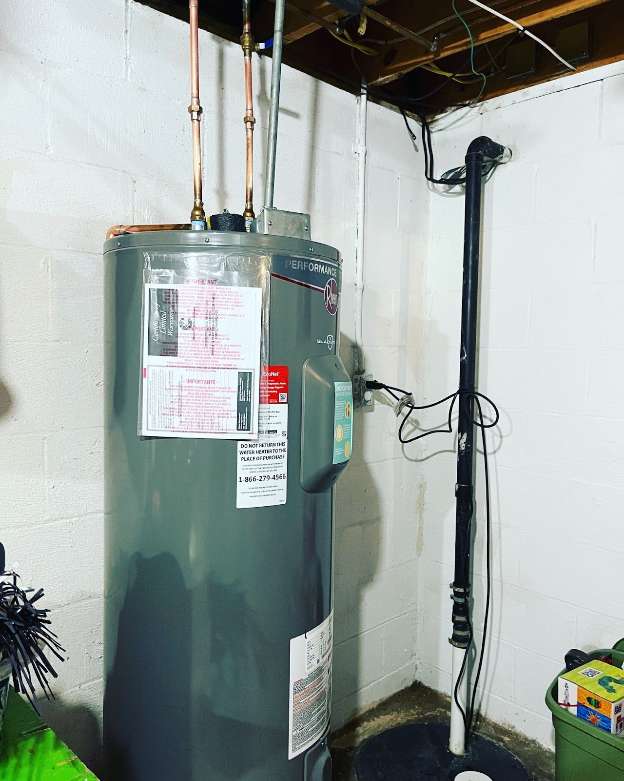 Man Fixing Water Heater — Dublin, OH — One Call Plumbing LLC