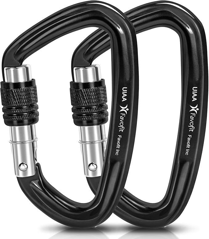 Two black carabiners are sitting next to each other on a white surface.