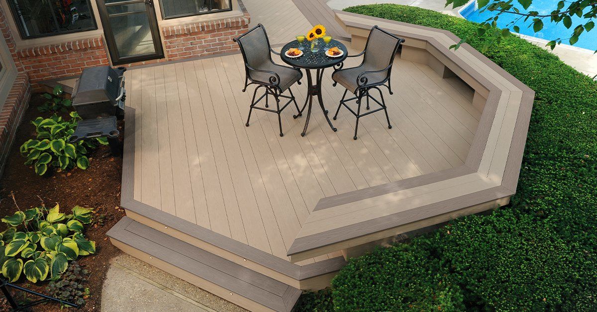 An aerial view of a deck with a table and chairs