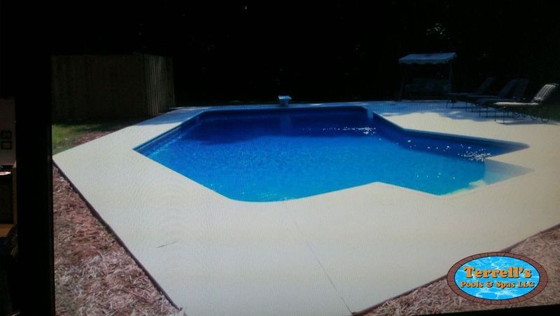 A picture of a swimming pool with a sign that says people 's pool experts