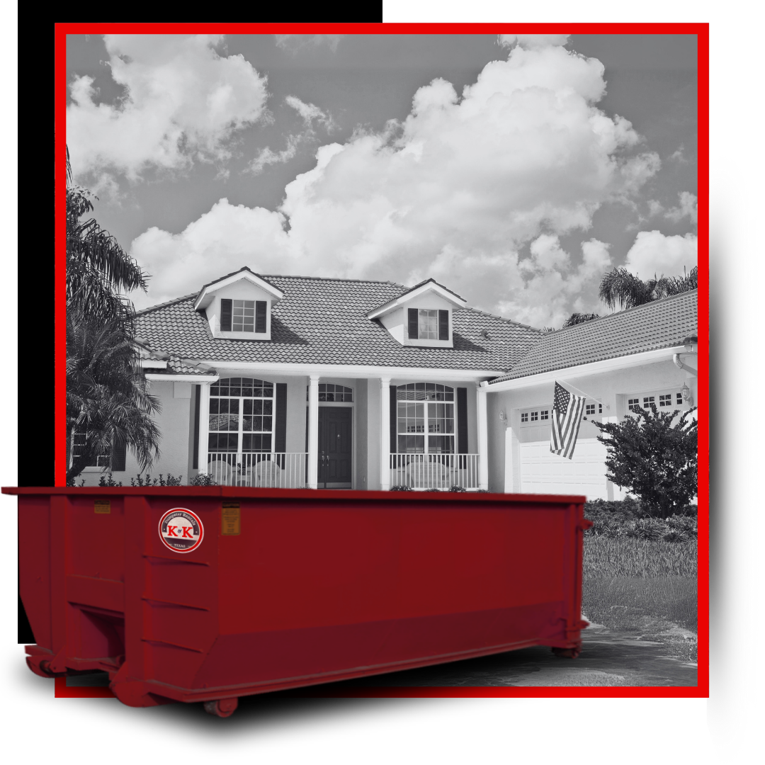 K&K Dumpster in front of a house.