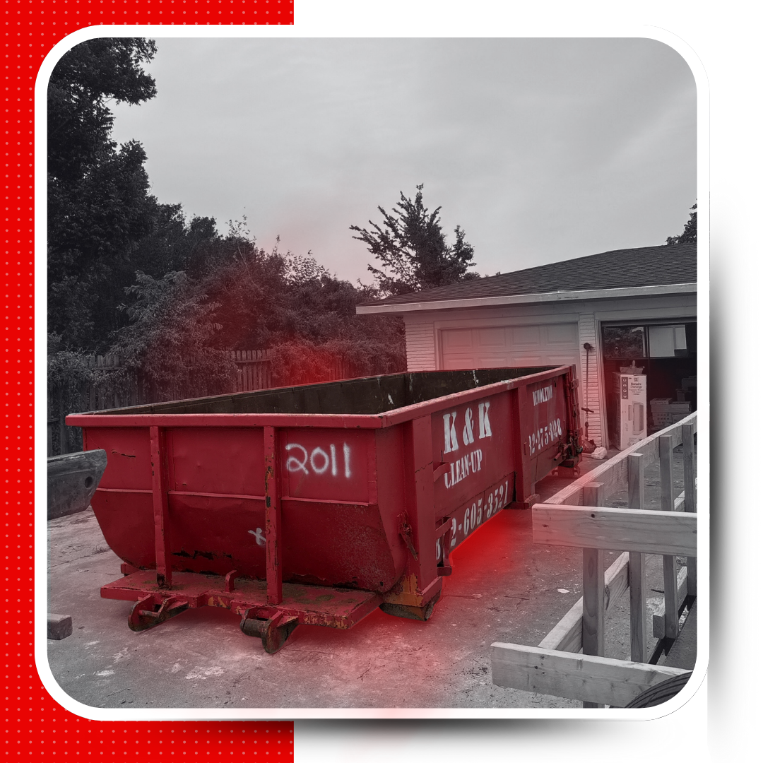 K&k Dumpster truck image with graphics around it