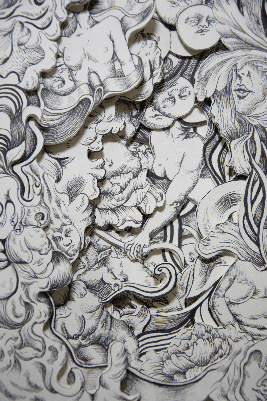 A close up of a black and white drawing on a wall