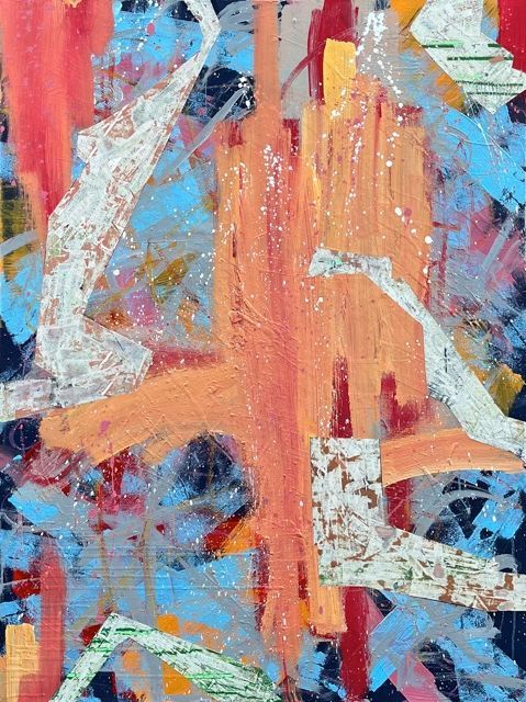 A close up of a colorful painting on a wall