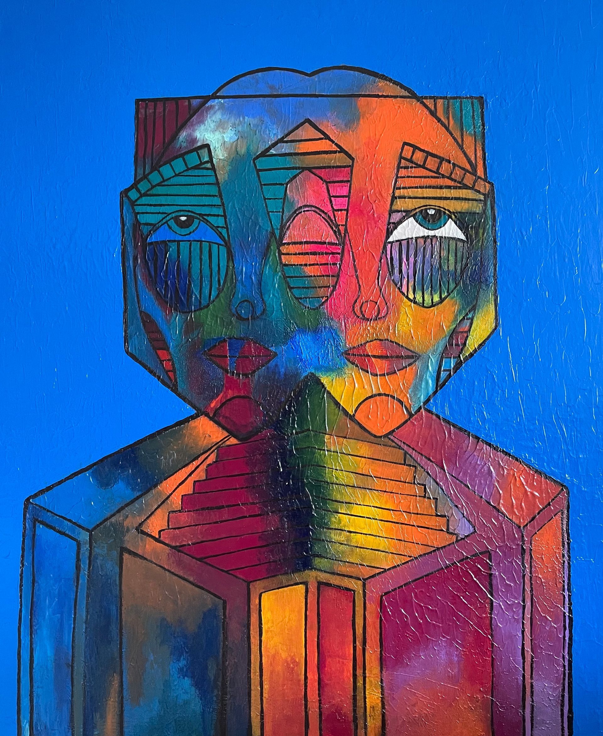 A painting of a colorful face on a blue background