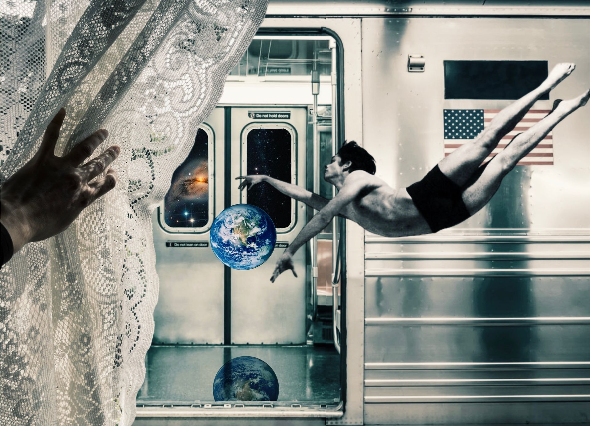 A man is flying through the air in front of an american flag