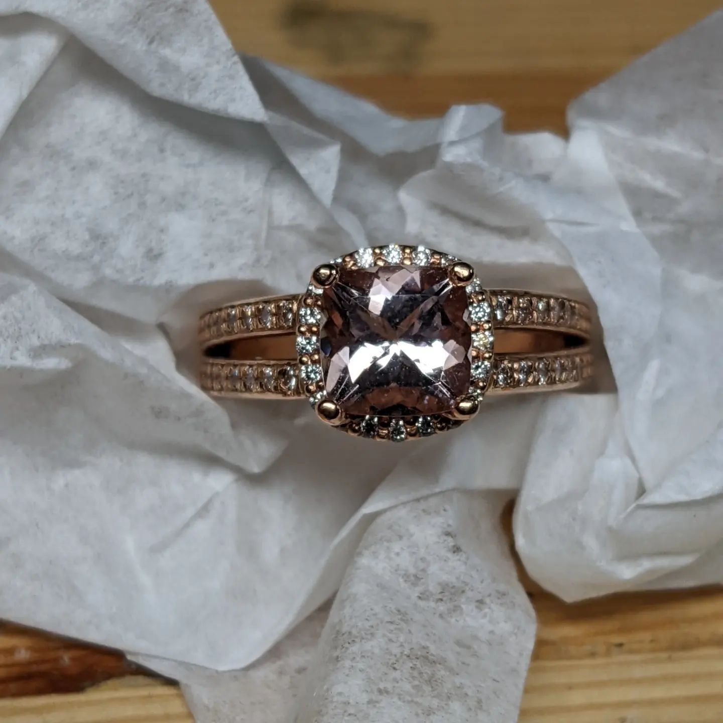 A ring is laying on a piece of paper