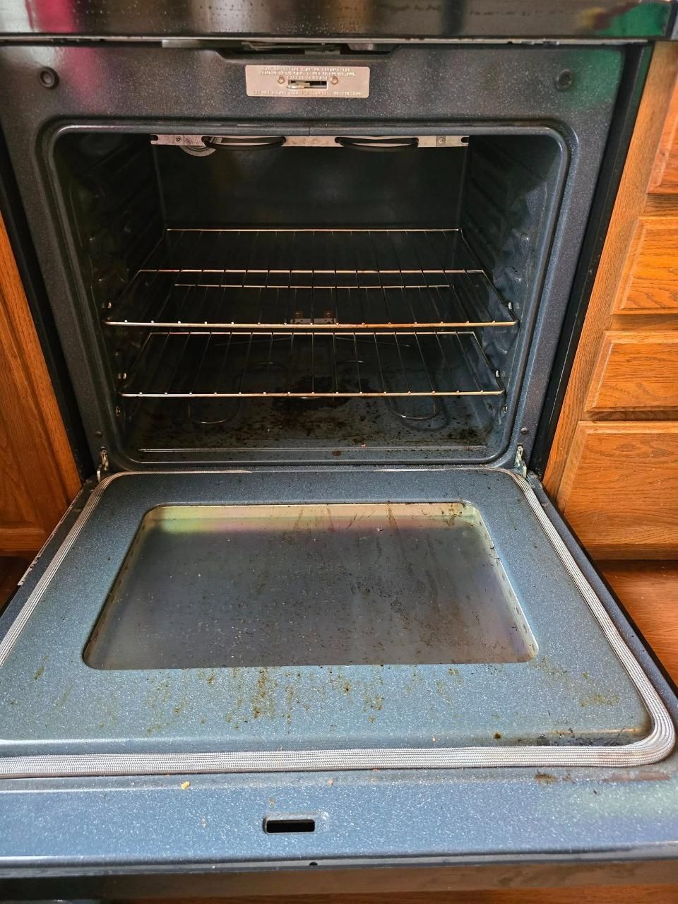 Before cleaning an open, empty oven.