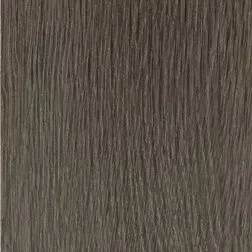 Close-up of a brown, textured wood grain surface, with vertical lines and a slightly uneven texture.