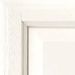 White painted wooden picture frame corner.