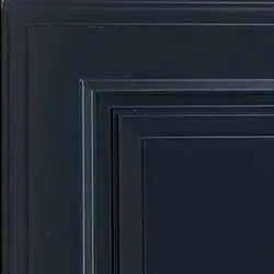 Close-up of a navy blue cabinet door, showcasing a detailed panel design.