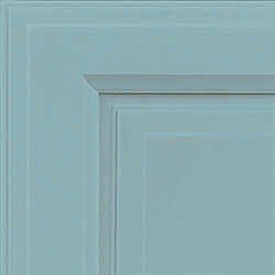 Close-up of a light blue cabinet door corner, showing the frame's edges and the painted surface.