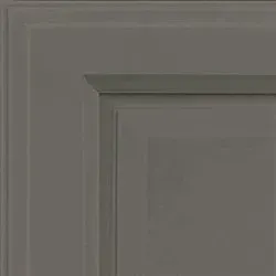 Gray cabinet door corner with panel and molding.