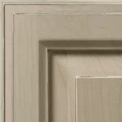 Beige cabinet door with layered molding.