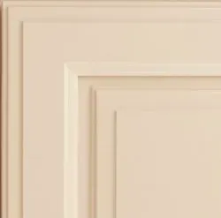 Cream-colored wall panel detail with layered square moldings, creating a recessed effect.