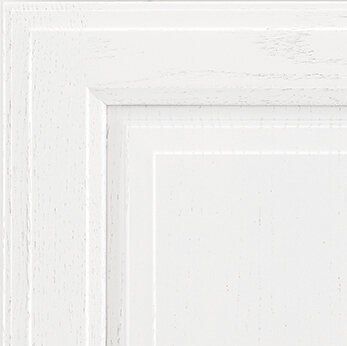 White cabinet corner with layered square molding.