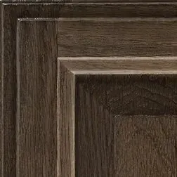 Close-up of a dark brown, wood-grain cabinet door panel with layered frames.