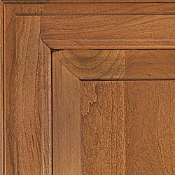 Close-up of a wooden cabinet door. Brown with visible wood grain.