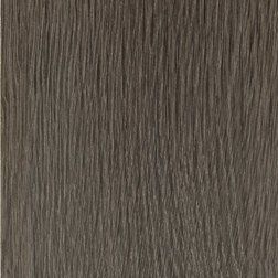 Close-up of textured gray wood grain.