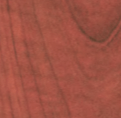 Close-up of reddish-brown wood grain, showing smooth texture and natural patterns.