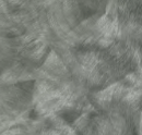 Gray, textured surface with swirling, fur-like patterns.