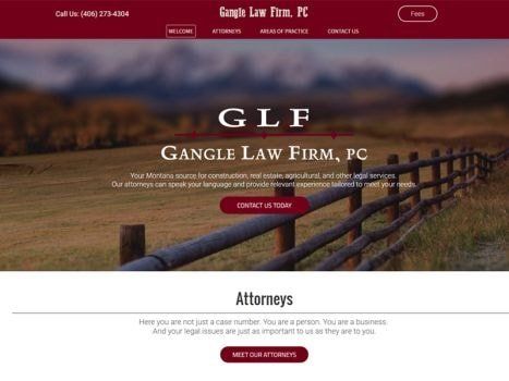 Website for Gangle Law Firm, with mountain and fence background, contact button.