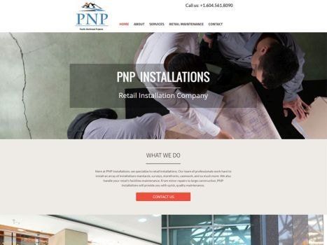PNP Installations website homepage with two people examining a large document.