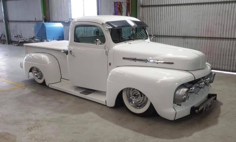 A white truck in garage— Burko Transmissions in Shepparton, VIC