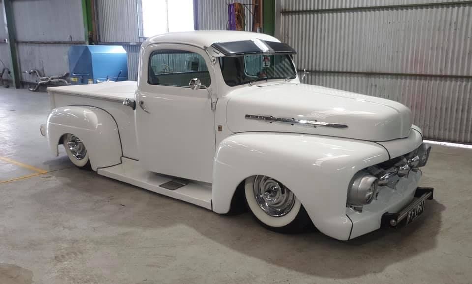 A White Pickup Truck is Parked in a Garage — Burko Transmissions in Yarrawonga, VIC