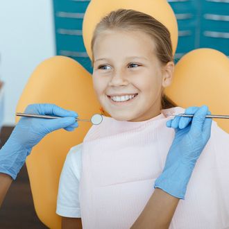 A Happy Kid On Dentist — Hollywood, SA — Norwood & Kensington Dental