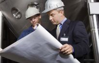 Client and one of our Engineers going over blueprints in Bairnsdale