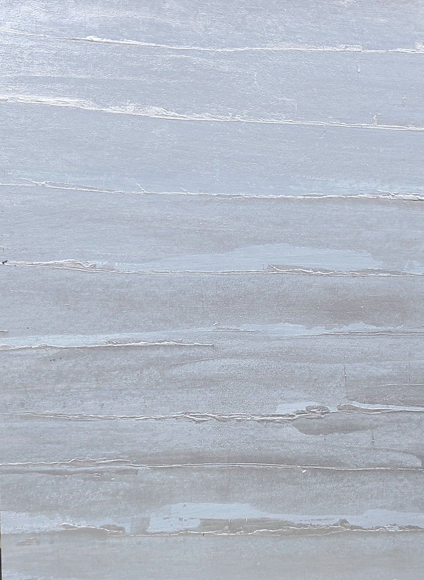 Horizontal layers of ice, varying shades of grey and white.