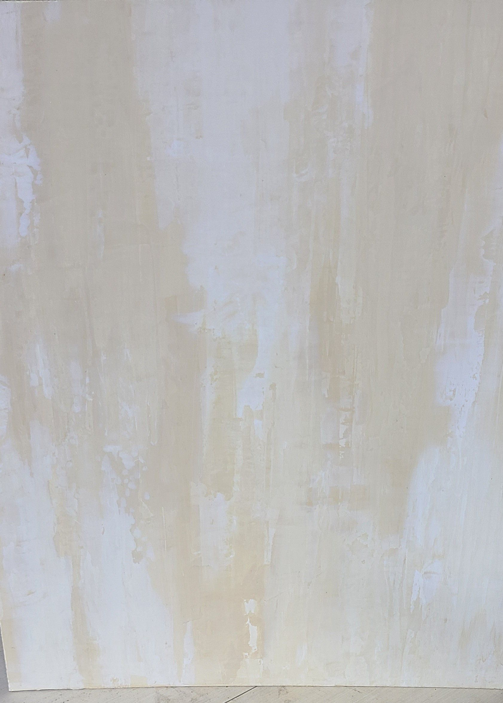 Beige and white textured wall.