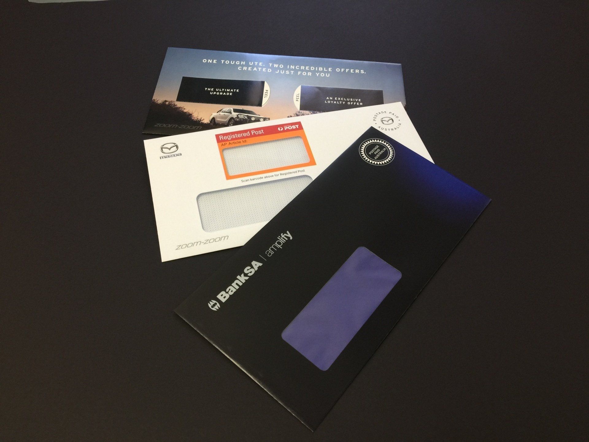 several envelopes are stacked on top of each other including one that says bank sa