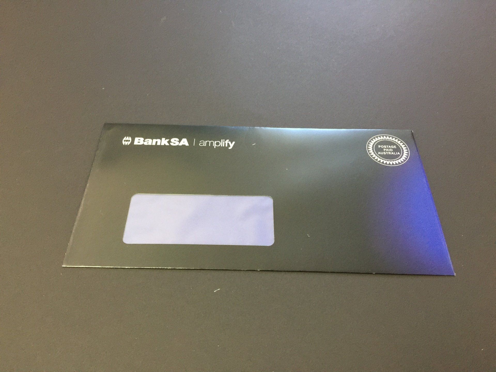 a black envelope with bank sa written on it