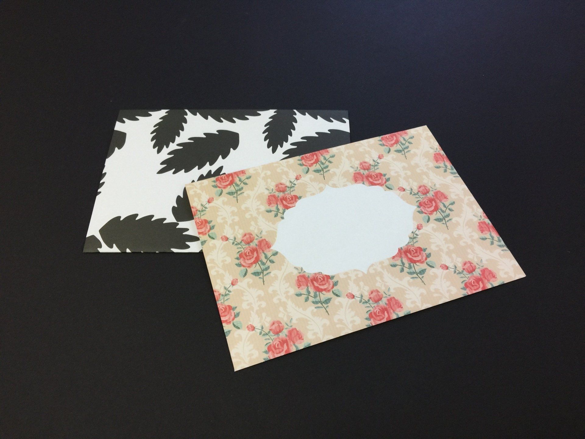 a evelope with flowers and leaves on it