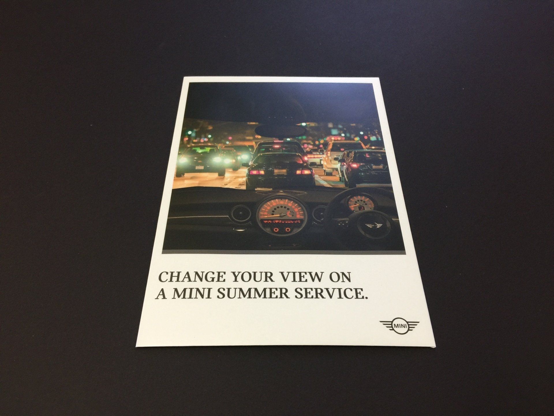 a evelope that says change your view on a mini summer service