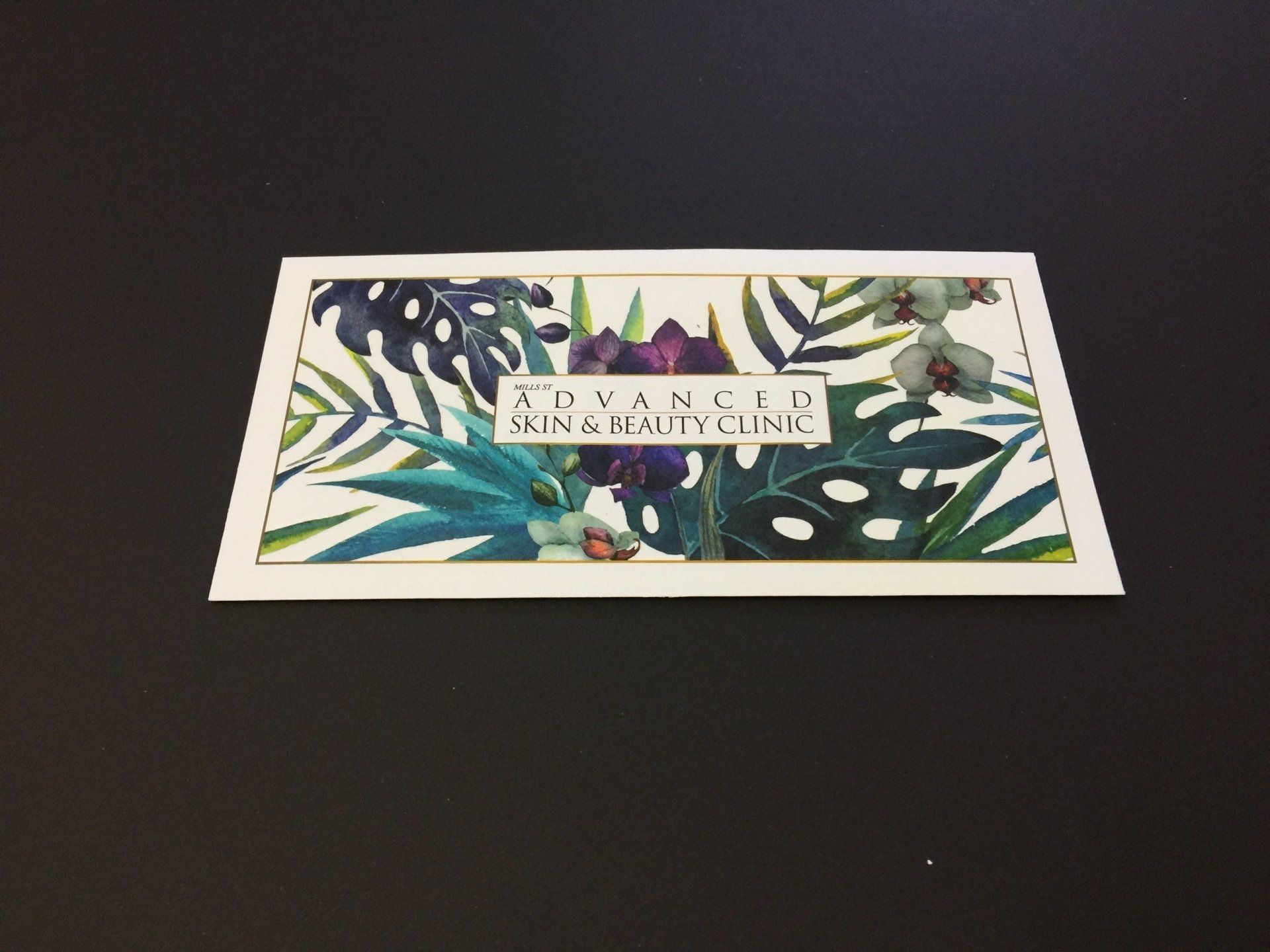 a evelope card for advanced skin and beauty clinic