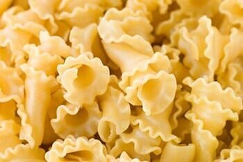 A close up of a pile of pasta that looks like flowers.
