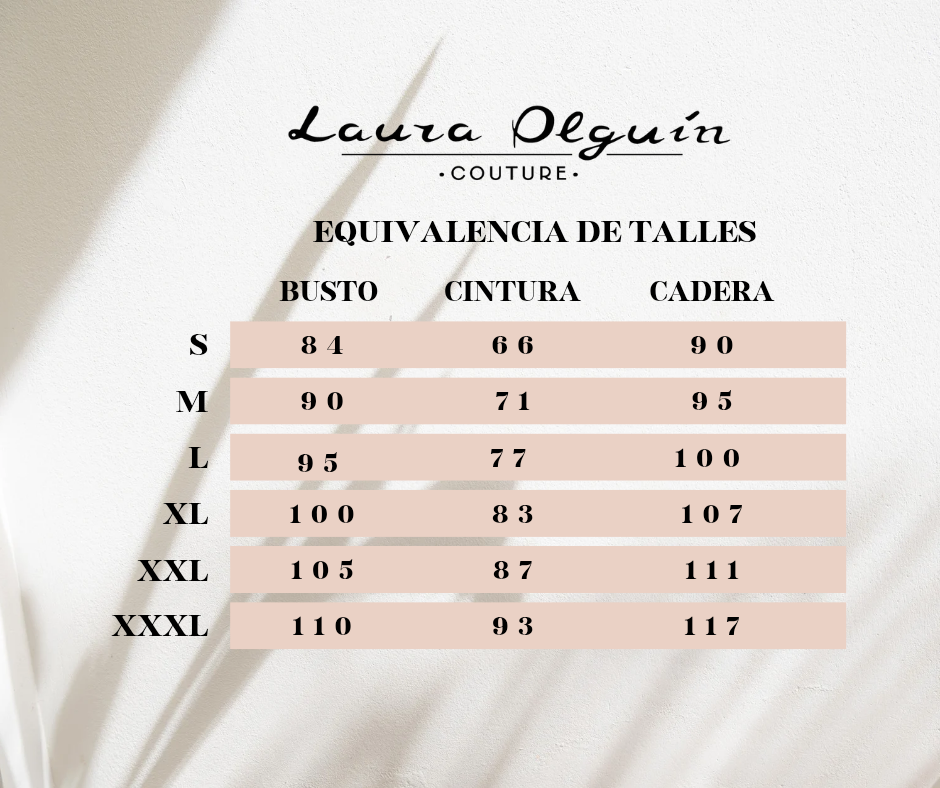 Una tabla de medidas para Laura Couture muestra las tallas S, M, L, XL, XXL y XXXL.