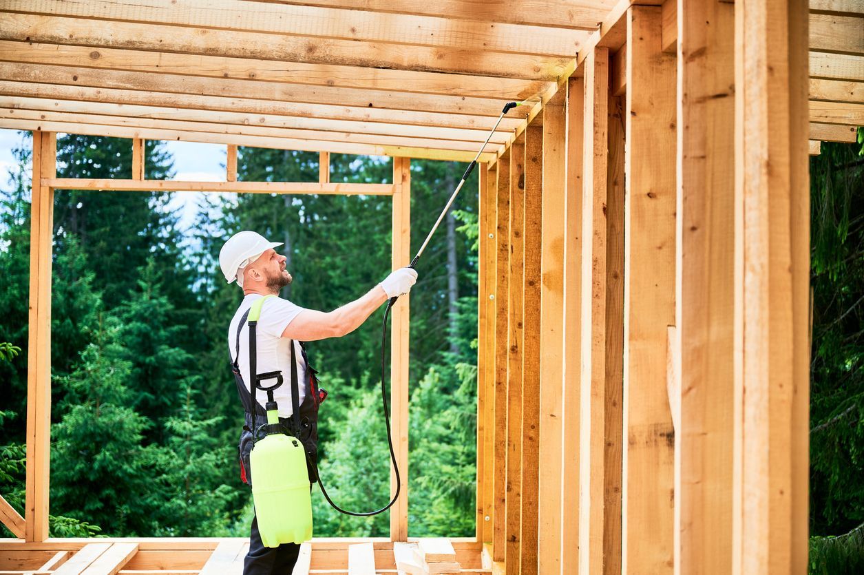A black silhouette of an ant inside a red circle with a diagonal slash through it, symbolizing a prohibition of ants.