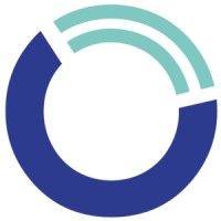 A circular logo featuring a large navy blue crescent and two smaller teal arcs in the upper right quadrant.