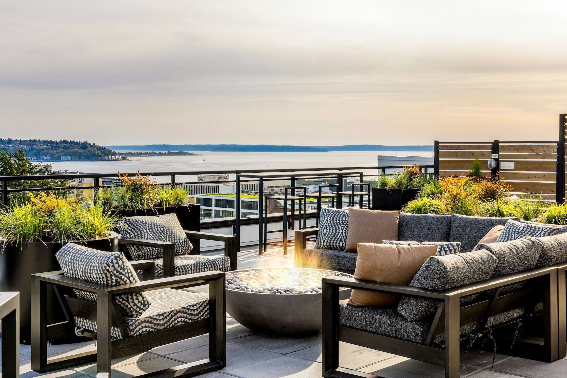 Rooftop deck with view of Seattle waterfront and firepit