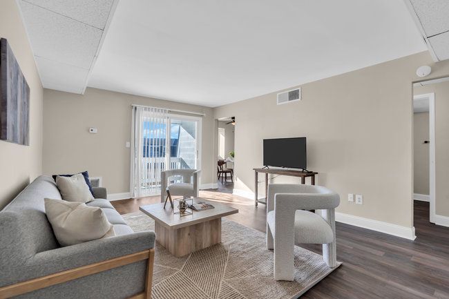 Bright living area with modern finishes at Town Bank Manor