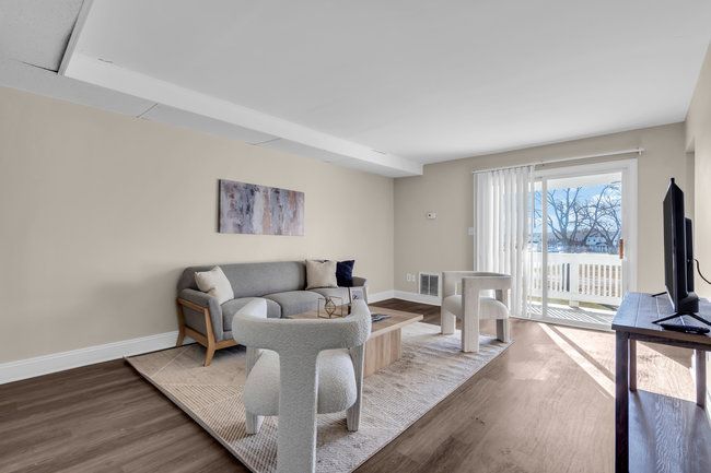 Bright living area with modern finishes at Town Bank Manor